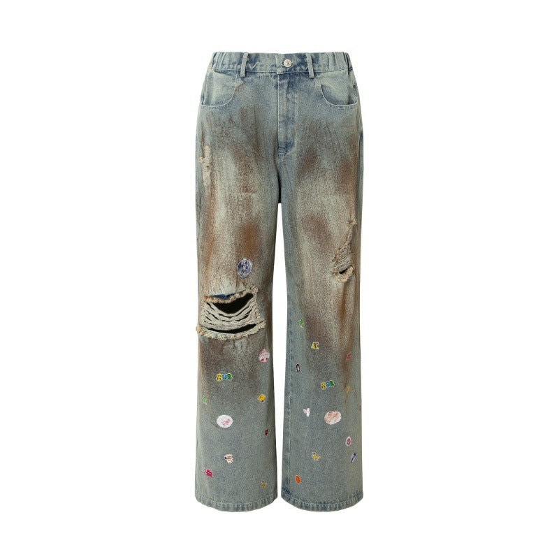 Jeans loose lavaggio ossidato spruzzato