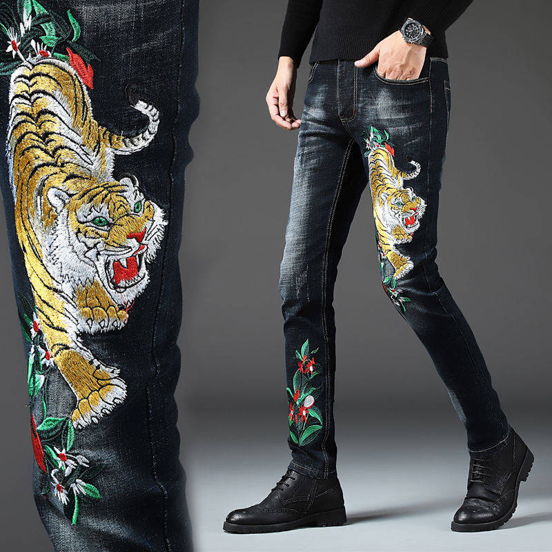 jeans slim ricamati tigre serpente elasticizzati