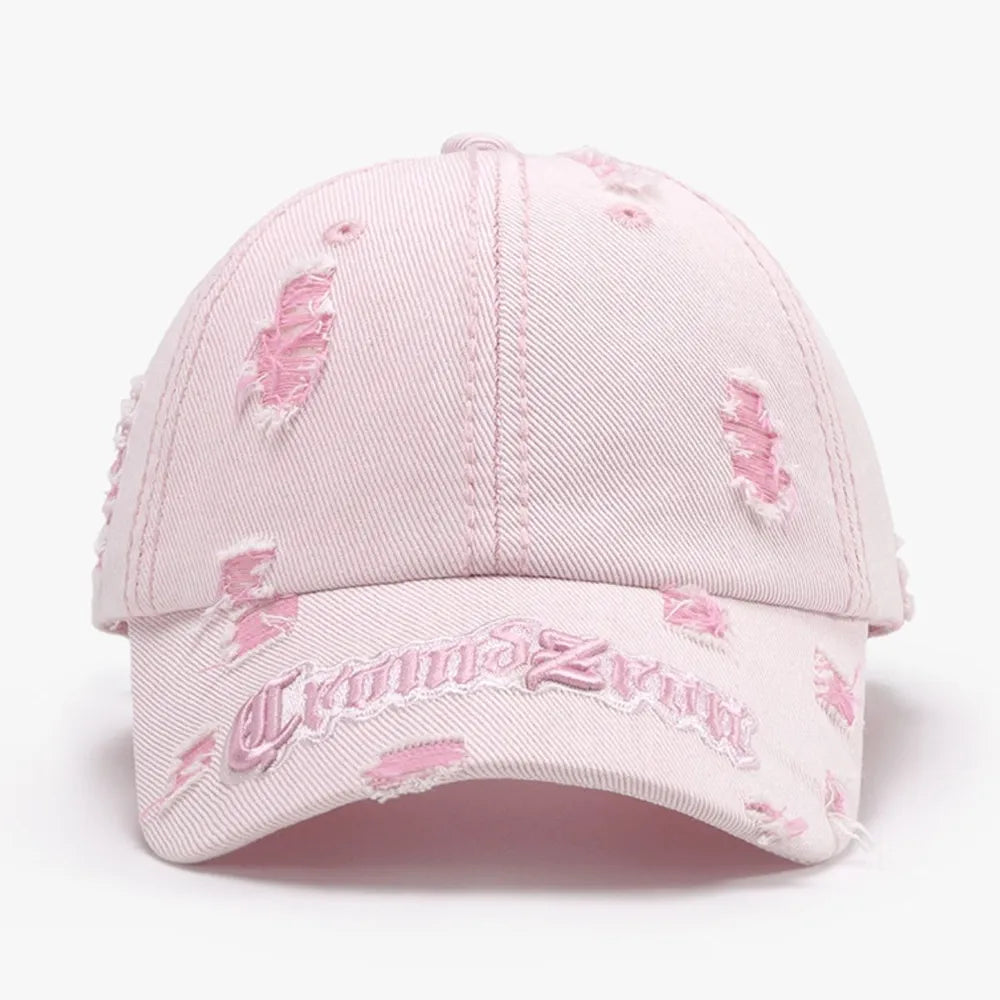 Berretto da baseball distressed con lettera ricamata