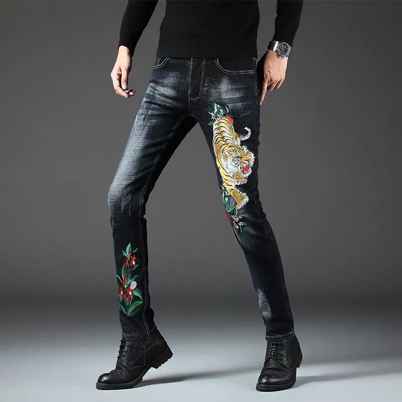 jeans slim ricamati tigre serpente elasticizzati