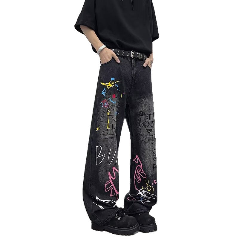 Jeans graffiti a gamba larga in denim