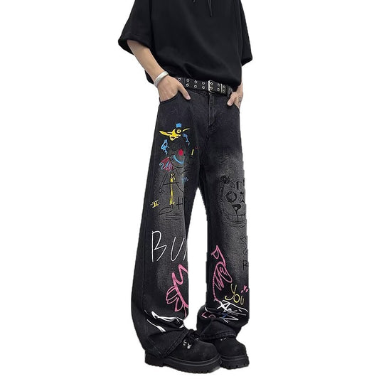 Jeans graffiti a gamba larga in denim
