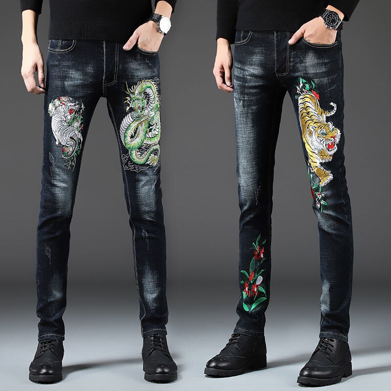jeans slim ricamati tigre serpente elasticizzati
